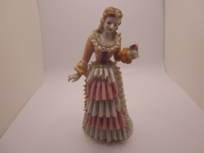 Vintage Orion 6 1/2 Inch Female Figurine Holding a Flower - Made in Japan