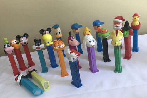 PEZ Dispensers Lot of 21 PEANUTS, DISNEY GARFIELD, SANTAS, LAMB AND MORE