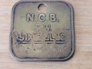 Six Bells Colliery. Square Brass Pit Check. No 887. Reasonable Condition.