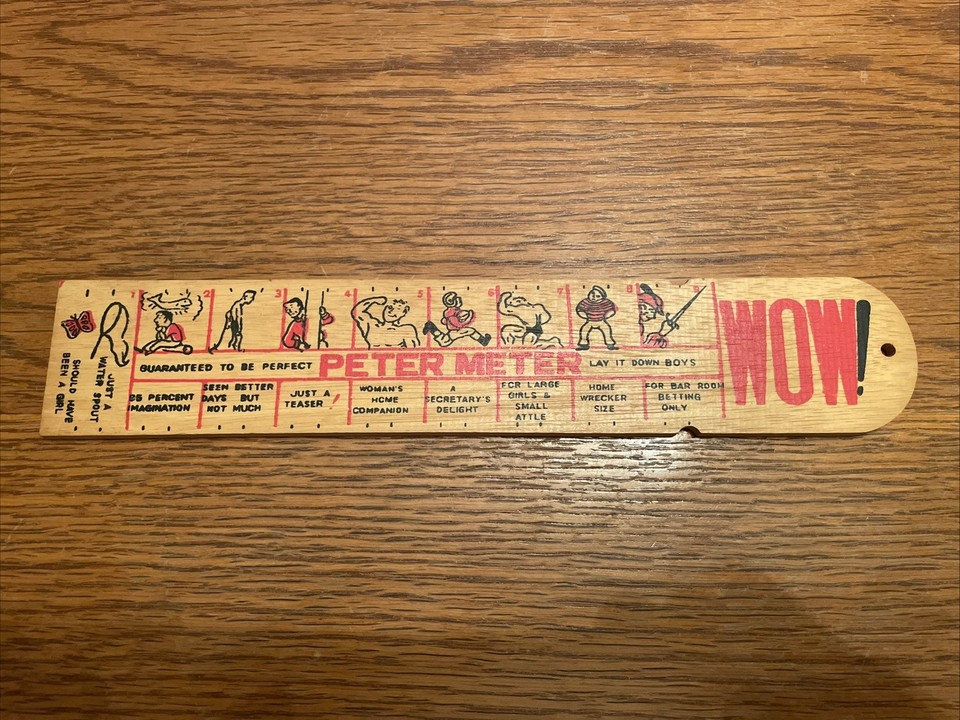 A vintage wooden 'Peter Meter' ruler — the kind of deadpan adult novelty that belonged on every 1970s office desk and still gets a laugh today.