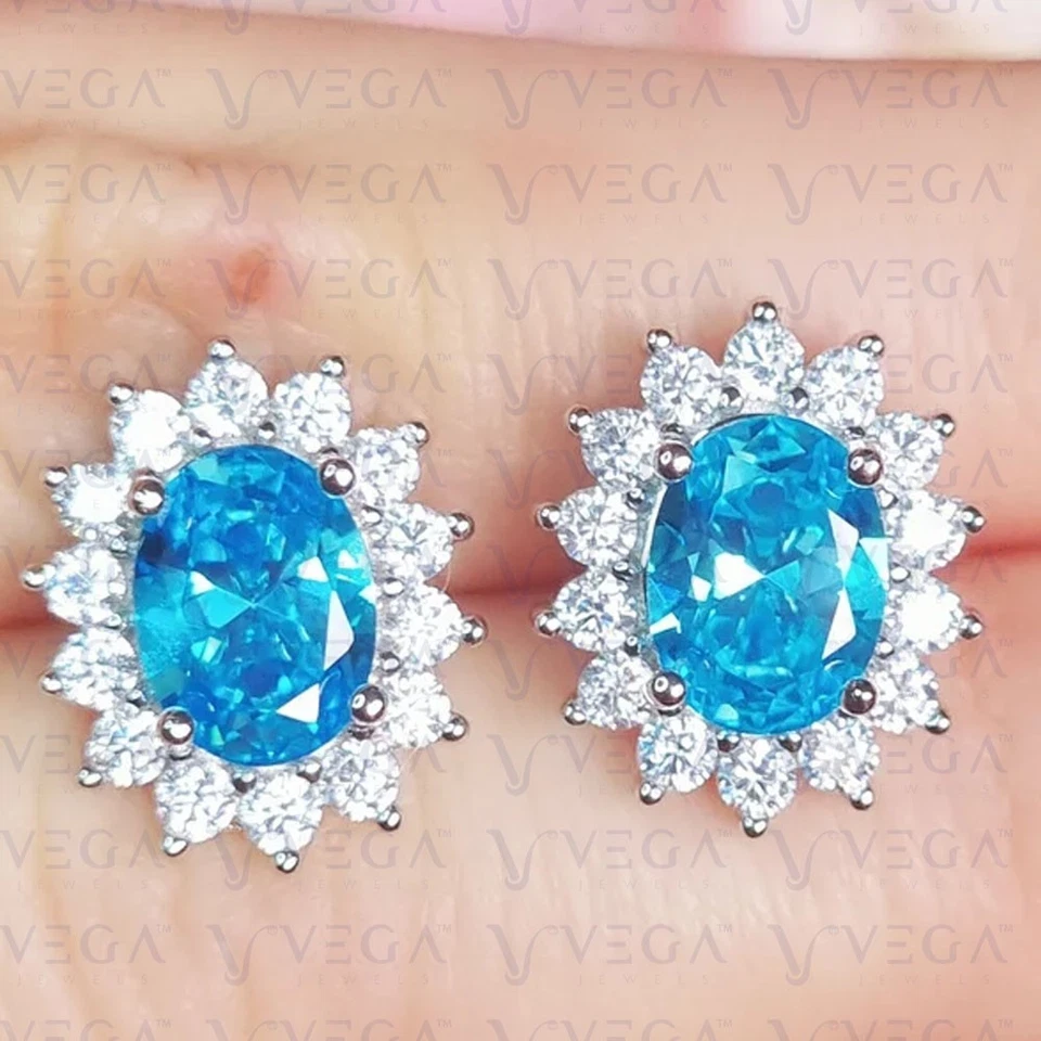 Pendiente de topacio natural ovalado de 4,20 quilates y halo de diamantes enchapado en oro blanco de 18 k Foto 3 de 4