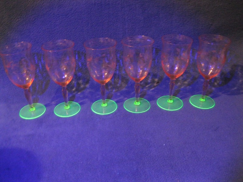 Six matching pink Depression era etched wine glasses with uranium glass bases