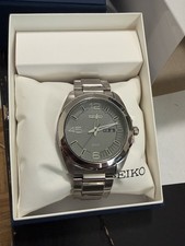 Seiko Mens Solar SNE273 Stainless Steel Analog Day/Date Wristwatch