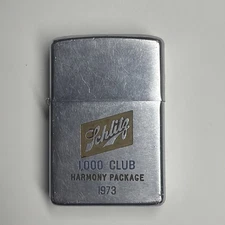 1973 Adverting 1000 Club Harmony Package Vintage Schlitz Zippo Lighter