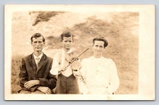 Vintage Real Photo Postcard Family Portrait Boy with Violin c1900-Now