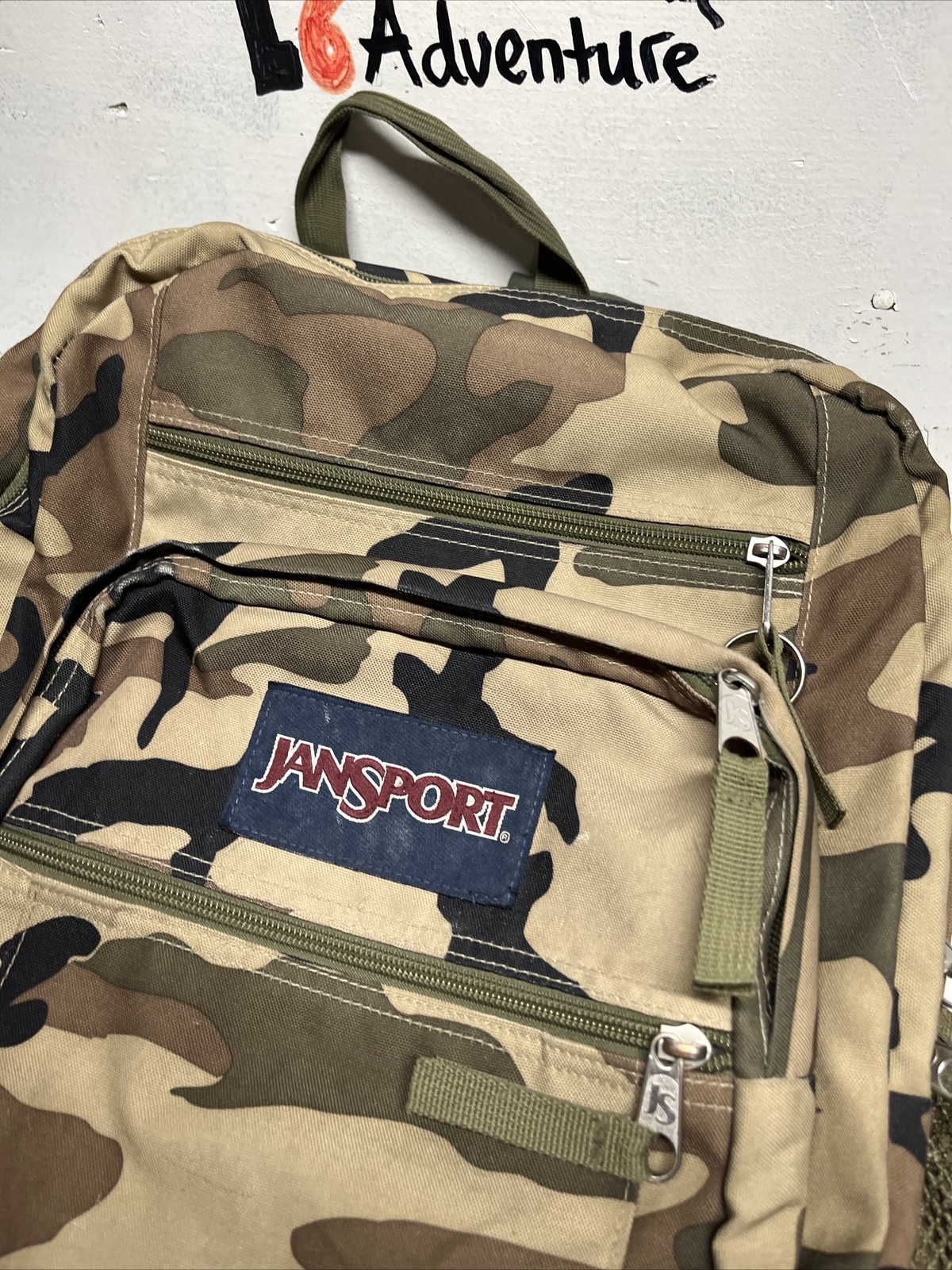 JanSport Big Student Backpack Camouflage Padded Shoul… Gem