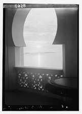 of Moorish Sunset scene a framed window by Zanzibar. character palace