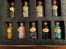 New In Box Nine 2” Bottles of Crystal Stones
