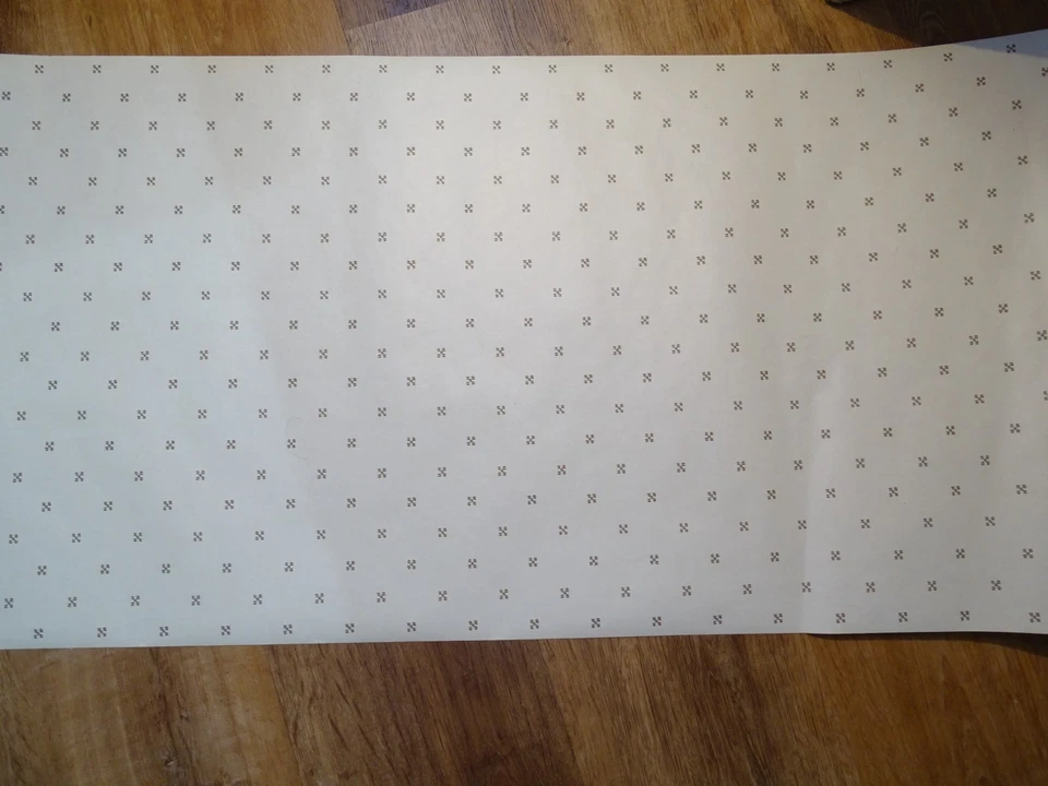 5 rollos dobles de papel tapiz marfil ligeramente estampado con formas marrones y verdes Foto 2 de 4