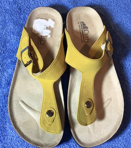 mustard yellow flip flops
