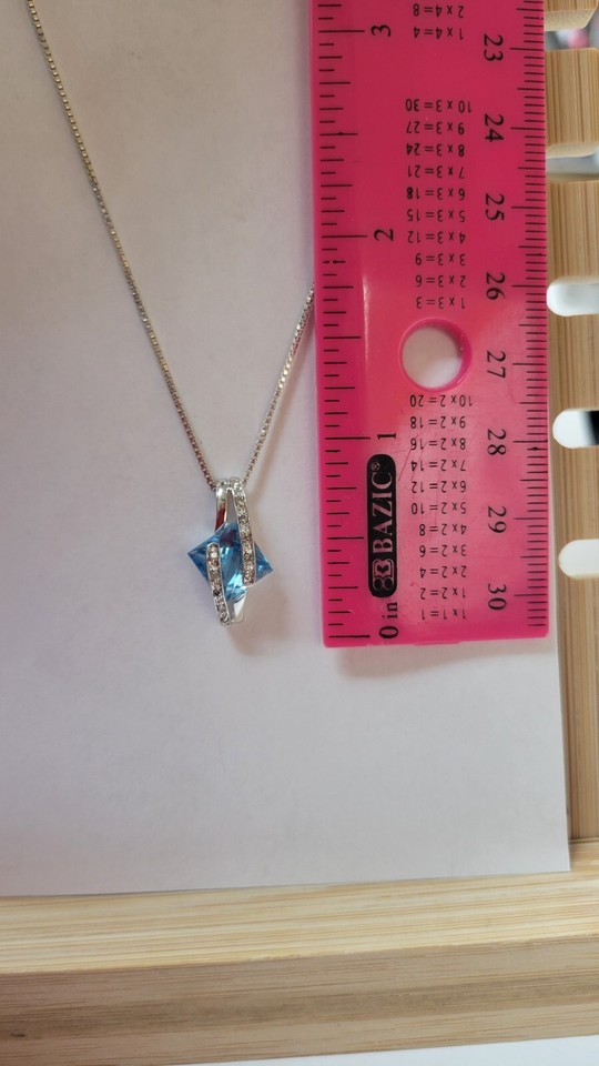 Genuine Blue Topaz & Diamond Pendant with .925 Silver chain Valued 599
