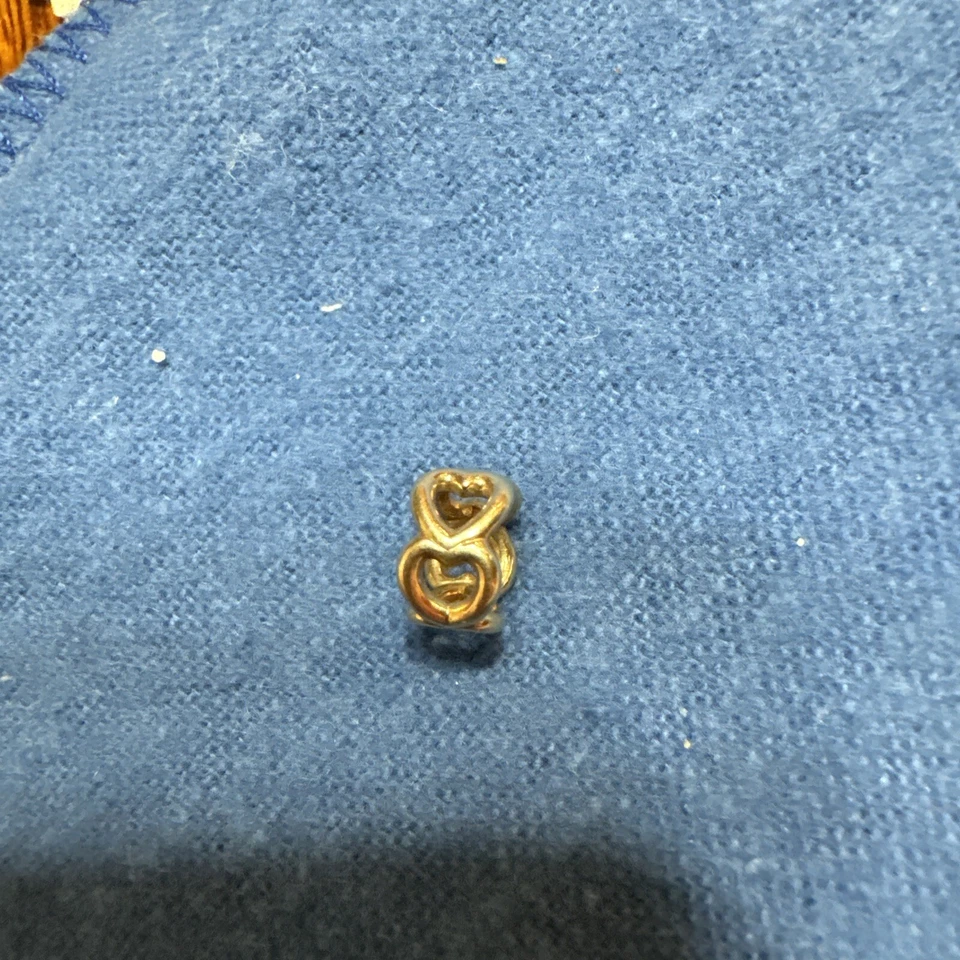 espaciador pandora oro 14k Foto 2 de 4