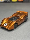 Hot Wheels Redline 1969 Orange McLaren M6A Grand Prix Racer, US