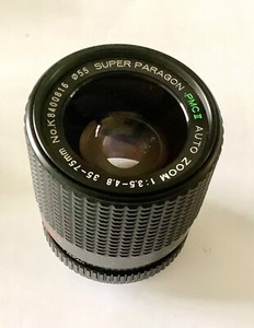 Photax super paragon PMC2 zoom lens. 35mm to 75mm auto pentax pk mnt uv filter