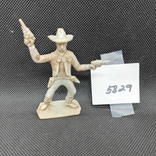 TOY COWBOY WITH TWO GUNS STAND PLASTIC 1 PIECE 3 1/4 X 2 1/2