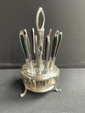 12 couteaux à fruits « Apollonox » sur support en métal argenté