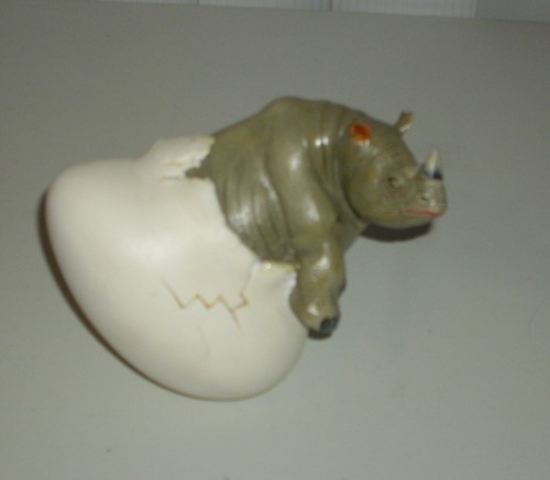 Vintage Statue of a Young Rhinoceros Rhino Emerging from an Egg.