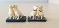 Pair of 1950 s VINTAGE MINIATURE CELLULOID DOG FIGURINES on black base