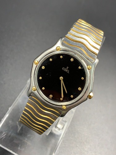Reloj de cuarzo vintage Ebel clásico ondulado medio dorado negro 14800194 781903 para hombre 33 mm - Imagen 18 de 23