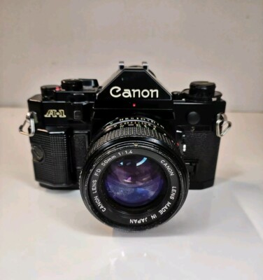 Canon A-1 Kamera analoge Kleinbild-Spiegelreflexkamera + Canon FD 50mm 1.4 Objektiv - voll funktionsfähig 