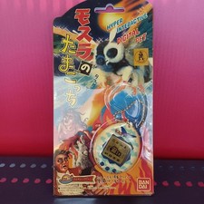 Mothra's Tamagotchi Model Mothra's Tamagotchi Mothra Logo BANDAI