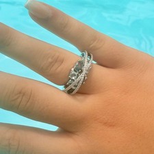 Ladies ring silver-filled criss-cross zirconia ring with aqua stones