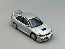 Mitsubishi Lancer Evolution IV Silver with engine 1/64 Scale Poprace