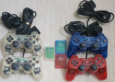 4 PS2 Dualshock 2 Controllers 2 Crystal 1 Ocean Blue 1 Crimson Red & 3 Mem Cards