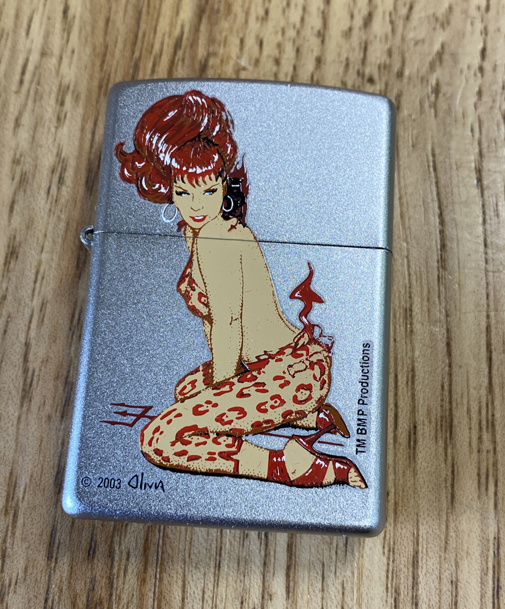 Olivia: Bettie Page She Devil Zippo with Seal Intact (2004) no box