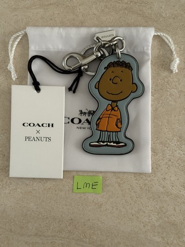 Coach X Peanuts CBG55 Franklin Borsa Charm Portachiavi 2025 75° Anniversario Nuovo con etichette
