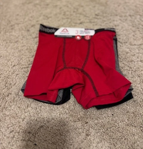 Calzoncillos boxer Reebok Performance para niños talla mediana 8/10 Foto 3 de 4