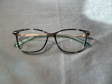 A Pair Of Zenni Eye Glass Frames  Smoke And W...