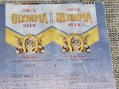 @ rare CONTINENTAL FLAT CAN OLYMPIA BEER LITTLE OLY ART WORK  Museum 1975's 8w5