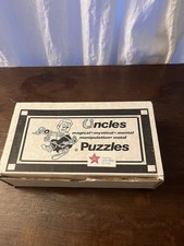 Uncles Puzzles Metal Disentanglement Brain Teaser Puzzle Silver/Blue w/ Box