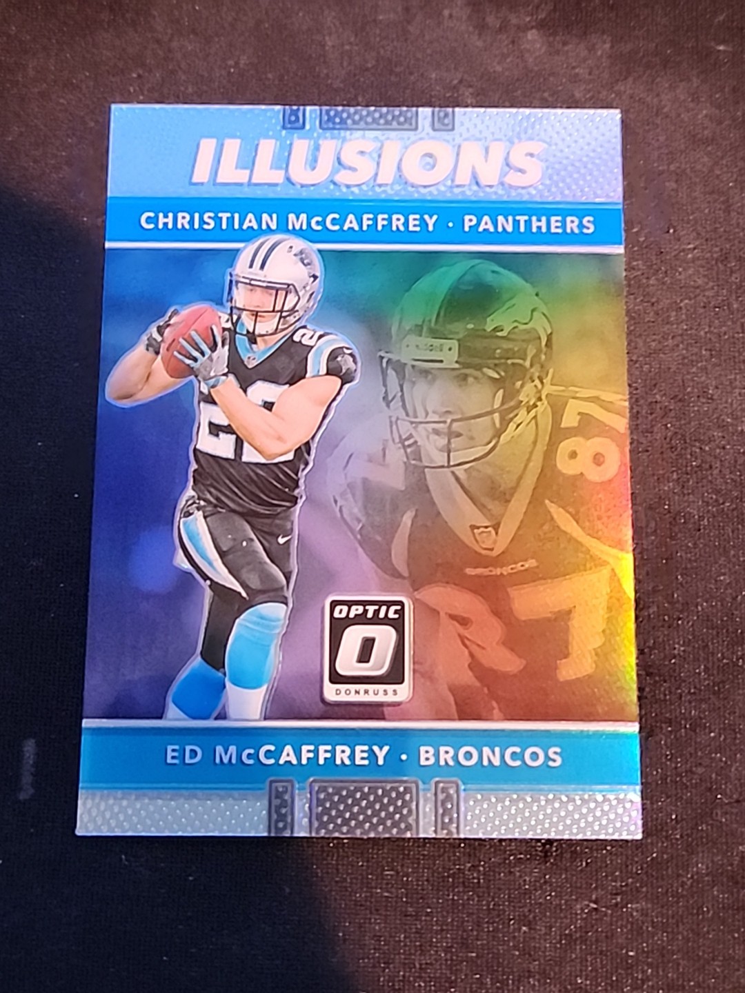 2017 Donruss Optic - Illusions Christian McCaffrey, Ed McCaffrey #18 Holo Silver