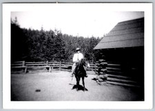 Vtg B&W Snapshot Woman Riding Horse Outside Log Cabin in Woods 1930s