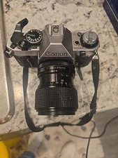 Vintage Canon AE-1 35mm SLR Film Camera w/ Canon FD 50mm 1 : 1.8 S.C. Lens