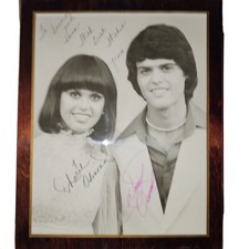 Donny and Marie Osmond signed 10.75  x8.5  On Wood Varnished