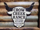 VINTAGE CROW CREEK RANCH PORCELAIN SIGN OLD CATTLE GRAZING COW STEER WYOMING