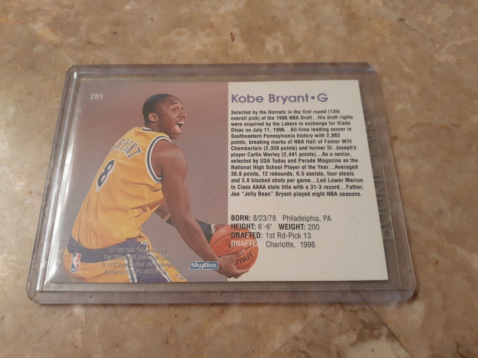 Mavin  Kobe Bryant 1996-97 NBA Hoops Official Skybox Rookie Card #281 RC  Lakers