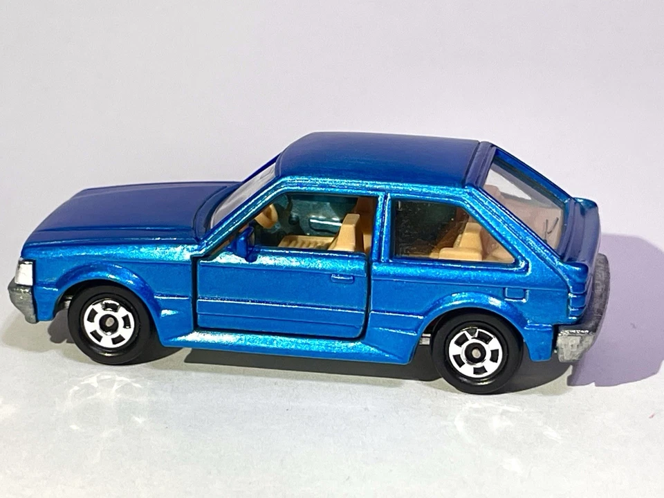 TOMICA 4 - MAZDA FAMILIA TURBO PERSONALIZADO PINTADO COMO NUEVO MUY BUEN ESTADO SOLO 1 Me gusta en eBay Foto 2 de 4