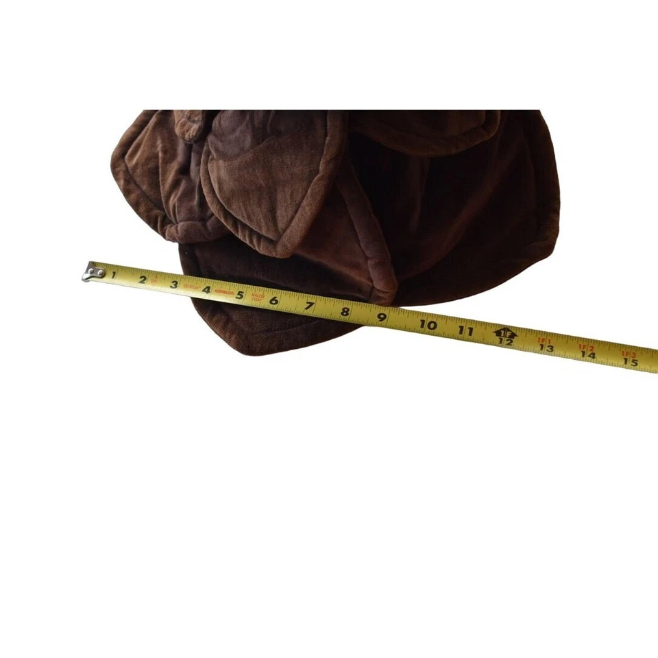 Acogedor té vintage de pétalos de flores de terciopelo marrón Foto 3 de 4