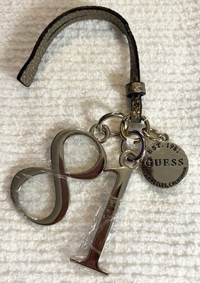 GUESS Purse Bag Charm Silver Tone Logo G I Est 1981 Metallic Strap Excellent