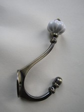 Ceramic antique brass hook hat and coat hooks vintage old English Victorian