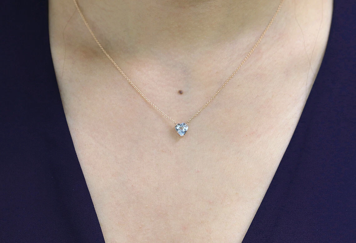 Gold and store aquamarine necklace