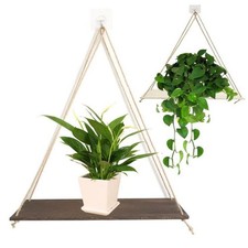 Space-saving wooden shelf for displaying plants and decorative objects