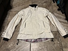 White jacket with black buttons and pockets. Size: L