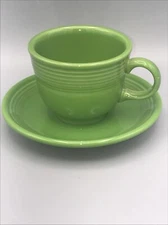 Fiestaware Green  Homer Laughlin Tea Cup And Saucer.  Two Different Dates