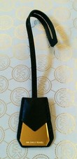 MICHAEL KORS GOLD MK LOGO CHARM WITH BLACK LEATHER STRAP HANDBAG FOB