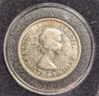Beautiful 1957 Canadian Silver Dollar Voyageur - three-line variety